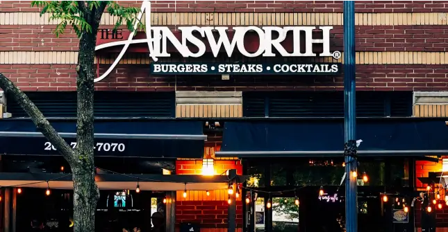 araff burgers and steaks - cocktails in a brick building